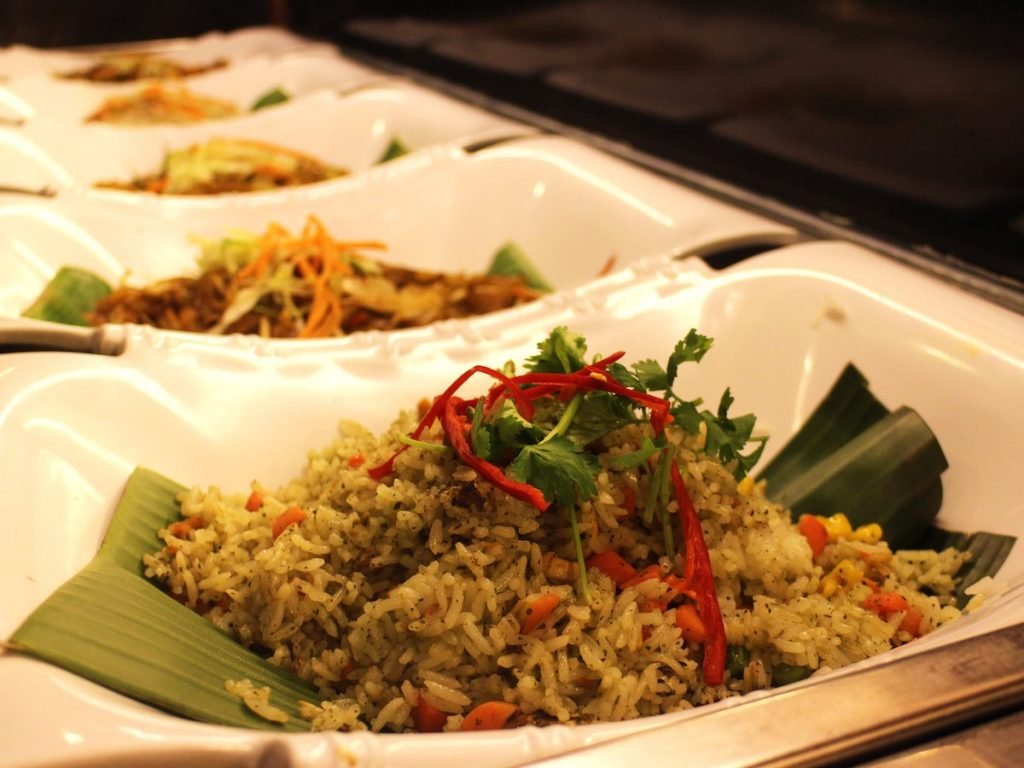 Vegetarian buffet spread, which includes rice