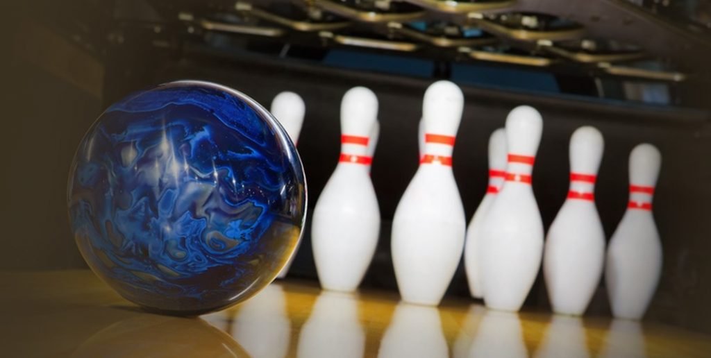 Blue bowling ball and pins at changi resort bowl alley