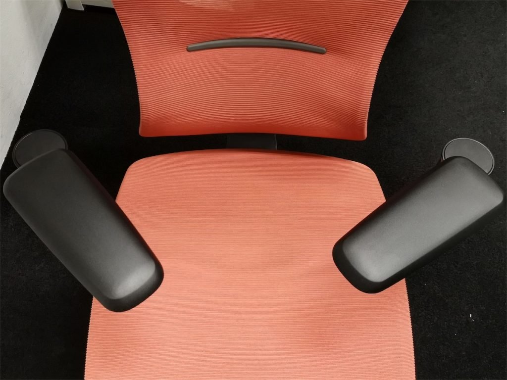 Top view of the ErgoTune chair armrests when rotated