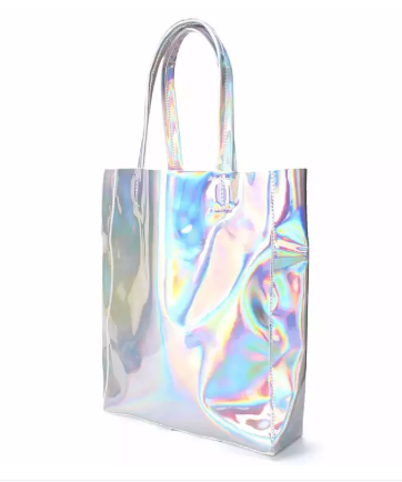 A shimmery silver bag that reflects a variety of colours, similar to an oil spill on the roadside during a hot day.